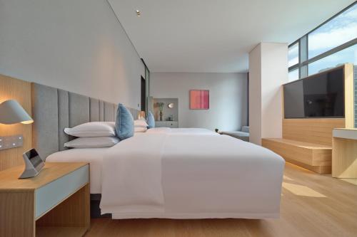 Deluxe Twin Room room in Pagoda Design Hotel Hangzhou Binjiang CBD