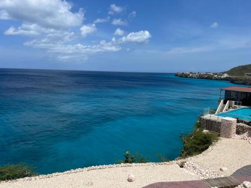 Vaade, Lagun Sunset Resort All Natural Clothing Optional in Lagun