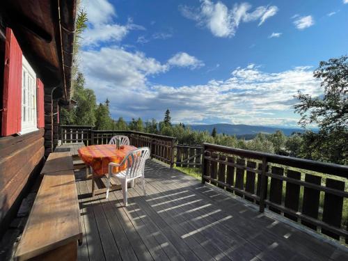 Terraza/balcón, Elveseter - log cabin with an amazing view in Ringebu