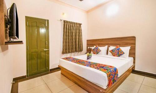 FabHotel Radha Residency