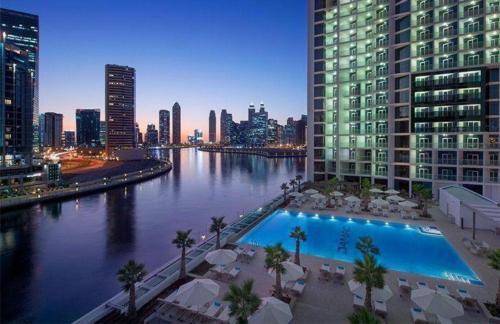 Business Bay Modern studio with a Canal view at DAMAC Maison Prive 1616, Dubaj (fotografie 3)
