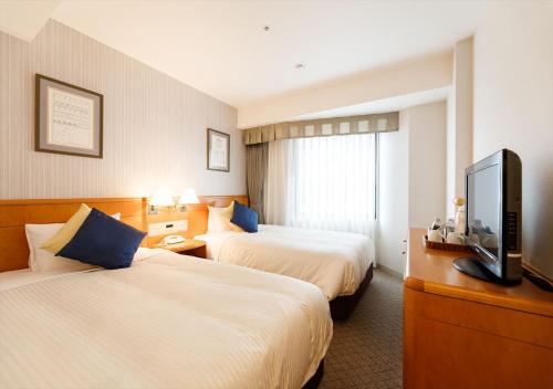 Twin Room - Non-Smoking image 10