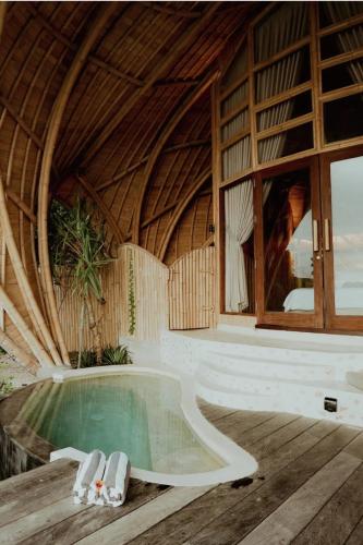 Swimming pool, Kini Resort - Oceanfront Bamboo Eco Lodges in Sekongkang Bawah