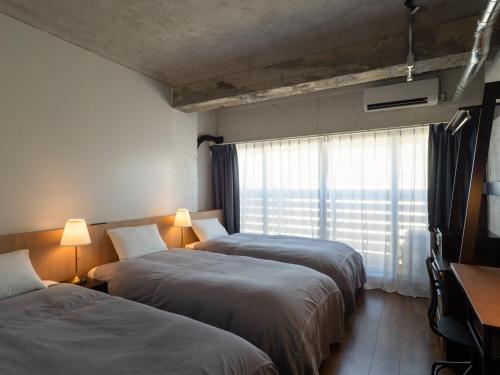 SEAMORE RESIDENCE Room Type - Moderate triple room