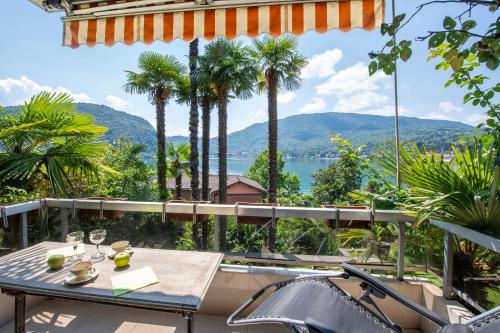  Queen Lake View - Happy Rentals, Pension in Ponte Tresa