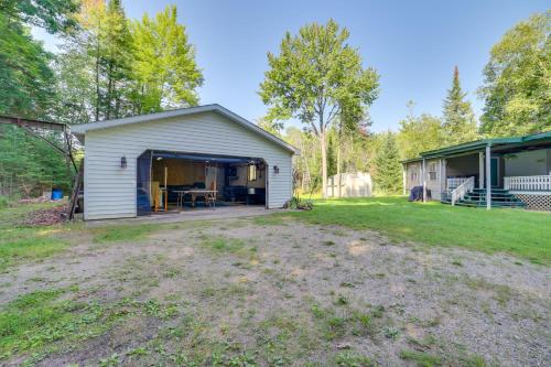 Houghton Lake Area Home with Fire Pit and Yard!