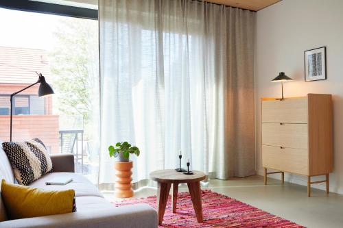 De ole School Ferienapartments Hohwacht BoHo14 - modernes Maisonette-Apartment mit Dachterrasse