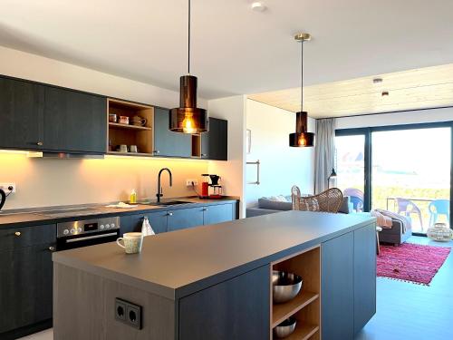 De ole School Ferienapartments Hohwacht Large-Apartment 25 , Huus Blomen in 霍瓦赫特