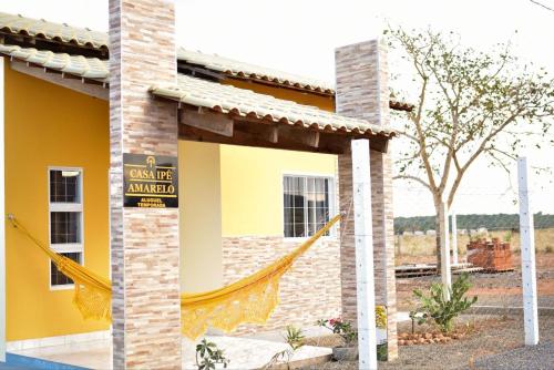 Casa Ipê Amarelo