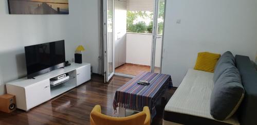 Yellow apartment central Podgorica - image 6