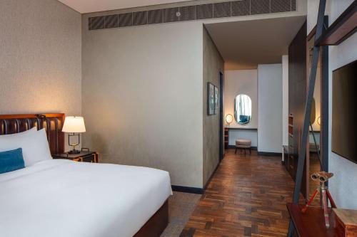 DoubleTree by Hilton Dubai M square Hotel & Residences Room Type - One-Bedroom Executive King Suite with View