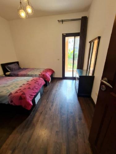 Luxurious Apartment in Mivida with Pool/Gym Access