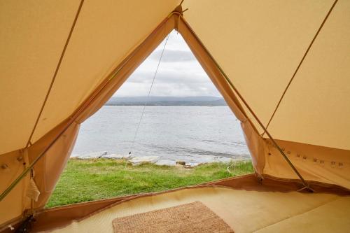 Sandtorgholmen Glamping - Tap to explore photos