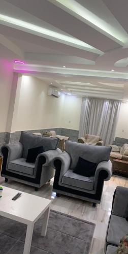 Shared lounge/TV area, شاليه. لمى ١ in Al Anud