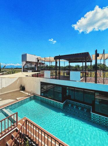 Swimming pool, Urban Glamp Resort Iloilo near St. John of Sahagun Parish Church