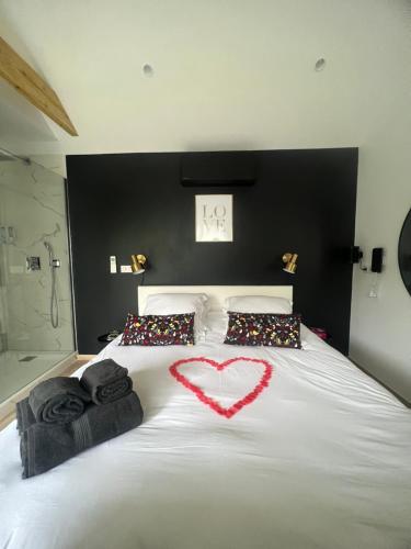 Suite romantique avec Spa et filet suspendu