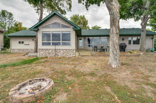 Lakefront Isle Escape with Dock and Fire Pit!