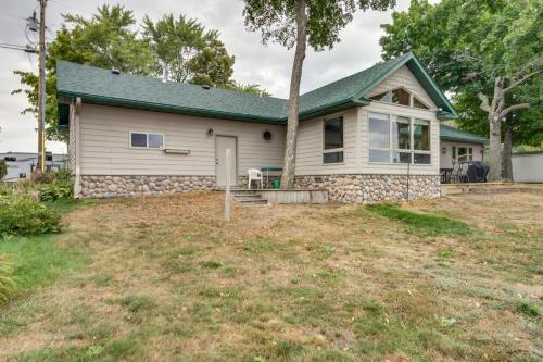 Lakefront Isle Escape with Dock and Fire Pit!