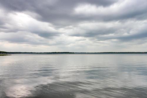 Lakefront Isle Escape with Dock and Fire Pit!