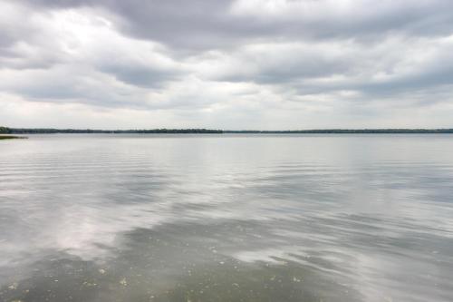 Lakefront Isle Escape with Dock and Fire Pit!