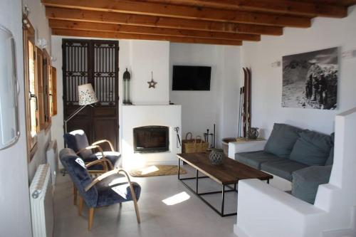 Jagatud salong / TV-ala, Casa Las Alacenas, Bubión (La Alpujarra, Granada) (Casa Las Alacenas, Bubion (La Alpujarra, Granada)) in Bubion
