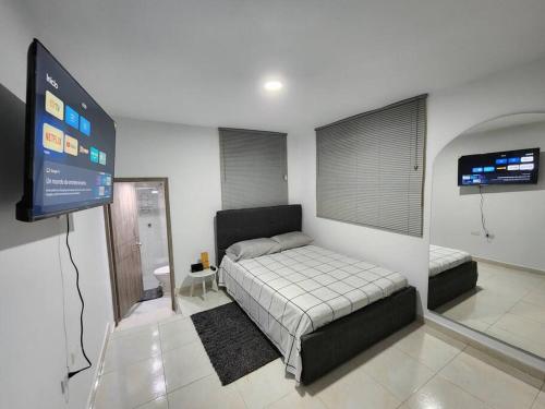 Apartamento céntrico con suave cama y wifi gratuito!