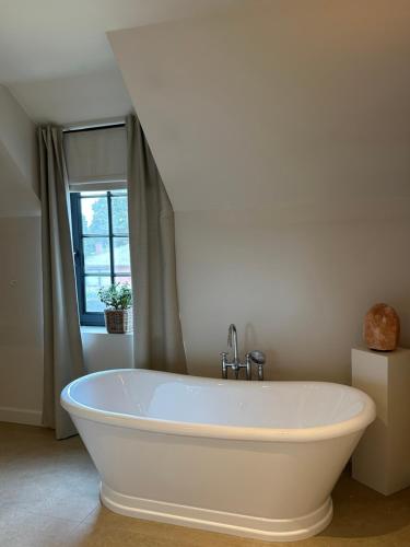 Fürdőszoba, Het Herenhuis in Genk