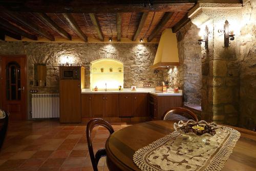 společenská místnost / TV salónek, Can Homs in Beuda