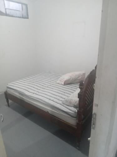 Hostel Leonardo Quarto com cama de casal