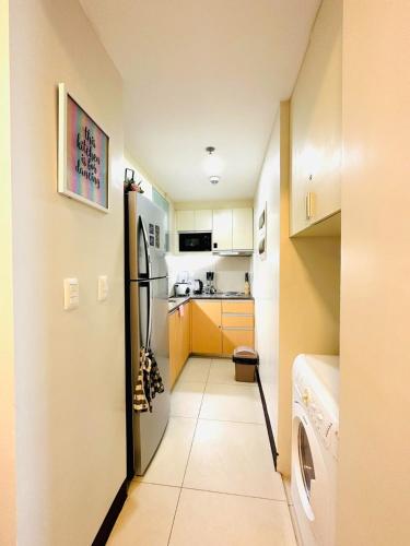 Mactan Newtown A by HiveRooms - 주방