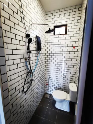 Quadruple Room with Private Bathroom image 2