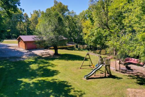 Riverfront Covington Cabin with Deck and Fire Pit!