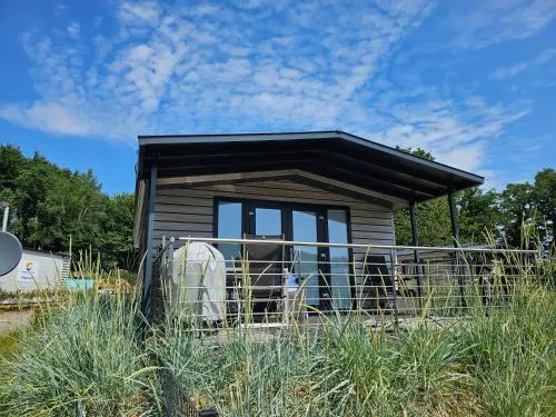 Ostseecamp Lübecker Bucht Ferienhaus "Beachhouse" mit kostenlosen Saunazugang in Scharbeutz, Deutschland