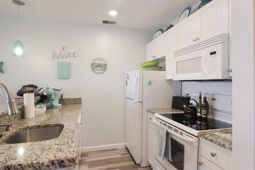 Beachside 108 with Pool Hot Tub and Direct Beach Access - image 2