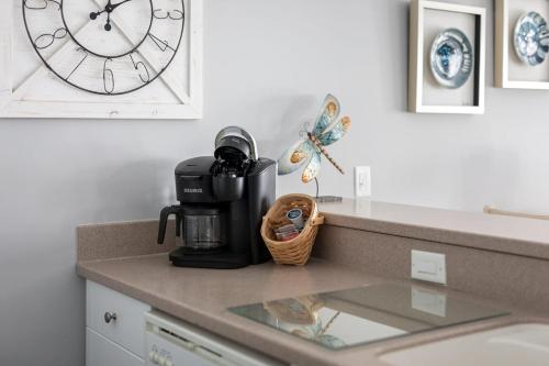 Beachside 213 with Pool Hot Tub and Private Deck overlooking East Bay - main image