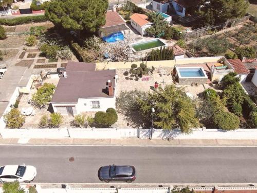 Casa con piscina y barbacoa