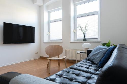 Komfortable Monteursunterkunft: 5-Zimmer-Wohnung mit 6 getrennten Betten, Couch und Fernseher