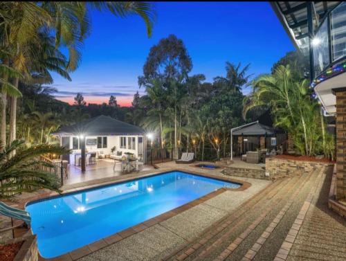 Paradise Retreat Resort Home with Waterfall & Pool on 2000m2