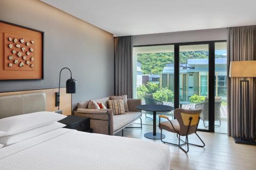 Deluxe Guest room, 1 King, Balcony room in Four Points by Sheraton Phuket Patong Beach Resort