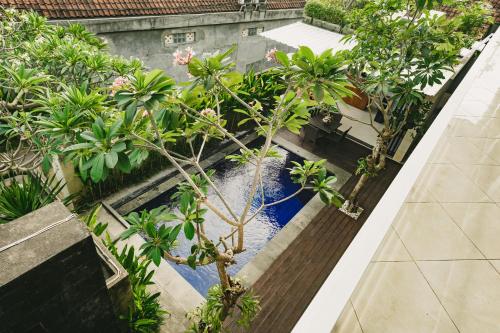 Happy Devi Guesthouse - Tap to explore photos