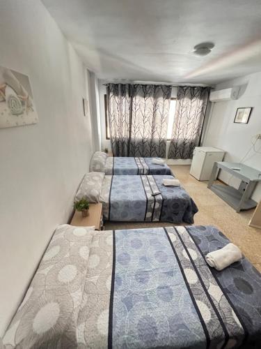 Triple Room room in pensión La Parada