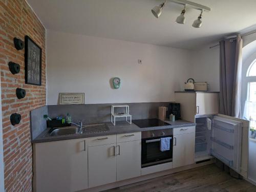 virtuve, Ferienwohnung Kaffestübchen (Ferienwohnung Kaffestubchen) in Oberschwarzach