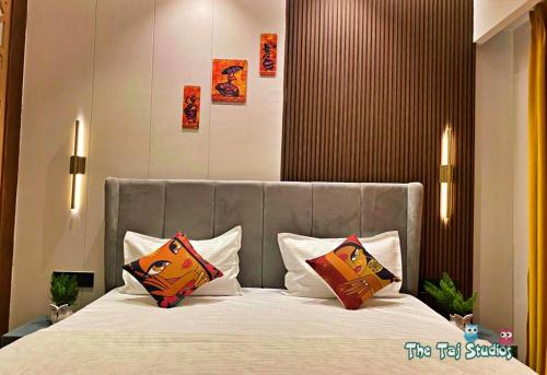 Cozy Stay within Galaxy Blue Sapphire Mall by Taj Studios