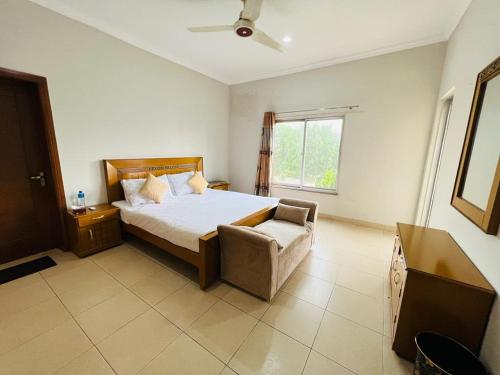 Haven Lodge Lahore by Haven Holiday Homes - 4BR Vacation Home with Lawn & Park Access - main image