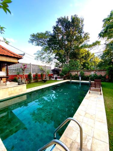 Puri Ayu Room Type - Deluxe Double Room with Bath