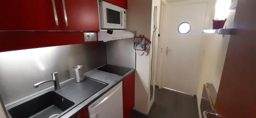 La Mongie, Studio pieds des pistes, parking intérieur privé