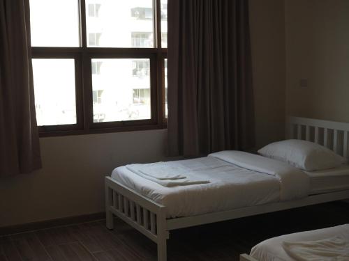 Krung Tone Hostel Room Type - Quadruple Room with Private Bathroom Krung Tone Hostel Room Type - Quadruple Room with Private Bathroom