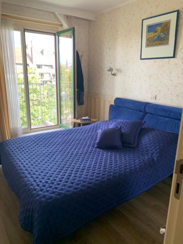 Kamer met terras te Kortrijk met uitzicht op de Leie