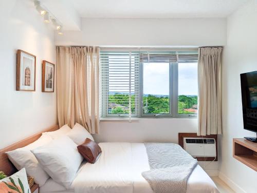 Bright & Cozy Studio Condo in Commonwealth, UP Diliman, Manila (foto 4)