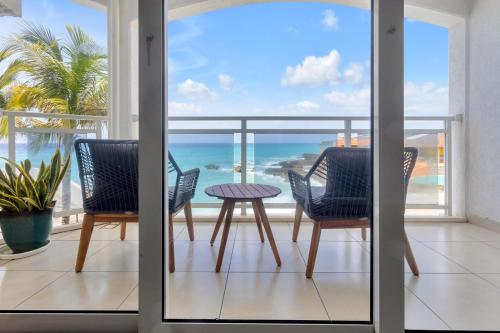 Balcony/terrace, Sand Bar Cove - Beach Bar Studio next to The Morgan Resort in Simpson Bay